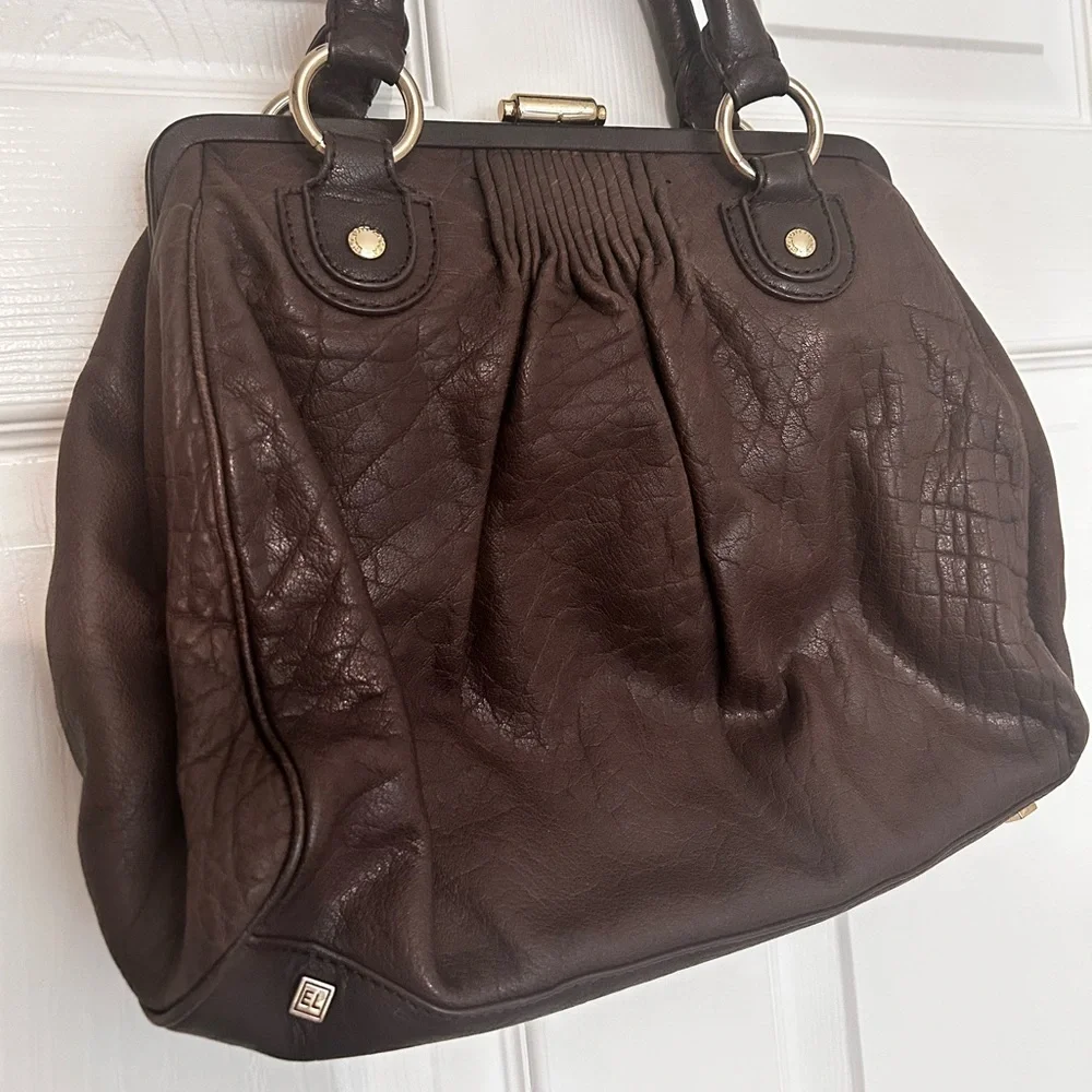 Elliott Lucca excellent used